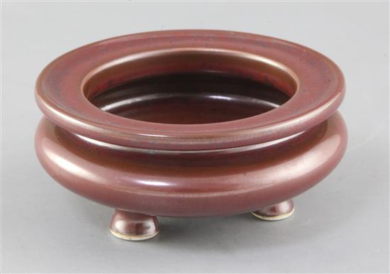 A Chinese faux bronze tripod censer, bearing a Qianlong seal mark, diameter 12.5cm